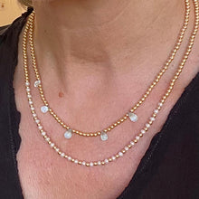 Load image into Gallery viewer, Gold beads Necklace with Aquamarine