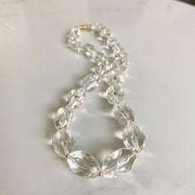 Load image into Gallery viewer, Crystal quartz necklace with gold accents
