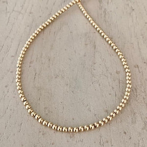 GOLD BALL NECKLACE