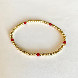 GOLD BEADS WITH CORAL