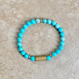 TURQUOISE BEADS GOLD CENTER