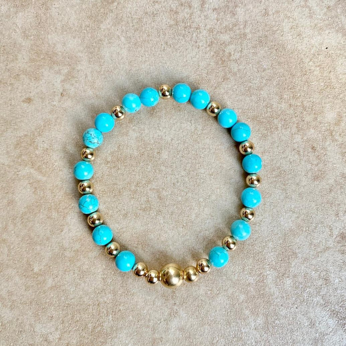 TURQUOISE BEADS GOLD CENTER