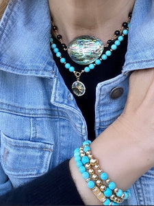 TURQUOISE BEADS GOLD CENTER