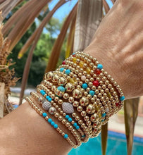 Load image into Gallery viewer, GOLD BEADS WITH TURQUOISE CENTER
